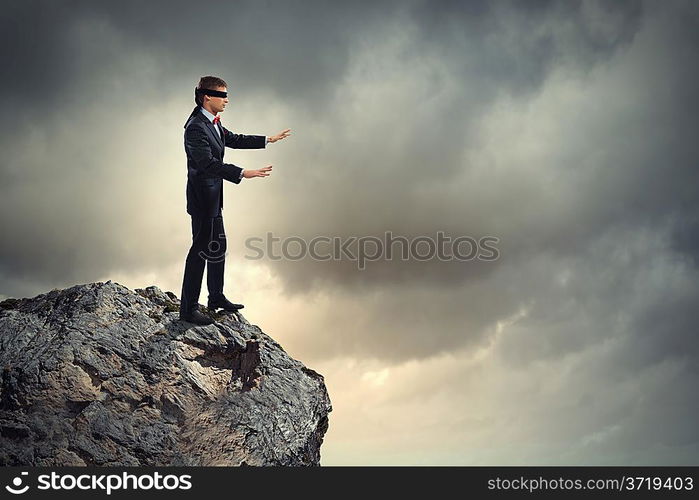 Businessman in blindfold