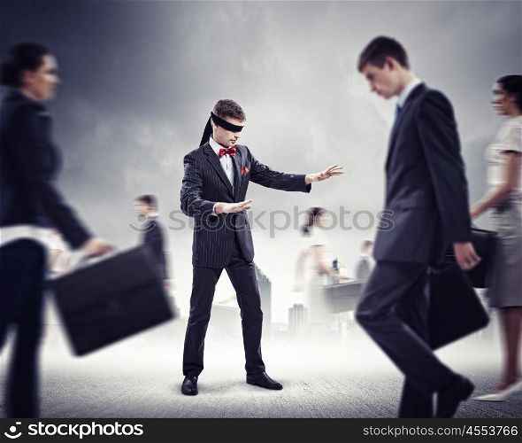 Businessman in blindfold among group of people. Image of businessman in blindfold walking among group of people