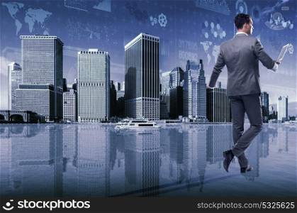 Businessman in business concept with laptop