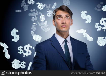Businessman in dollar financial concept