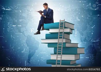 Businessman in education and learning concept