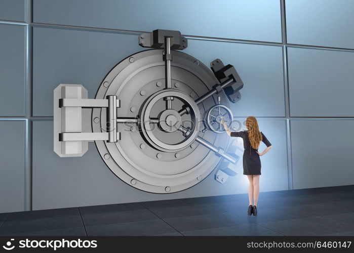 Businessman in front of banking vault door