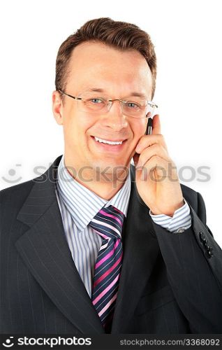businessman in glasses speaks on cellular telephone