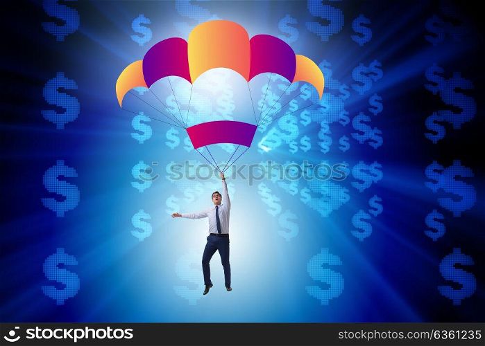 Businessman in golden parachute concept