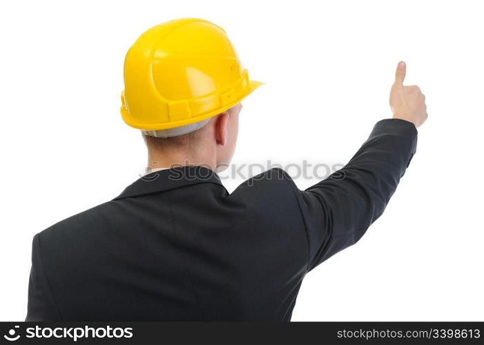 Businessman in helmet points finger up. Isolated on white background