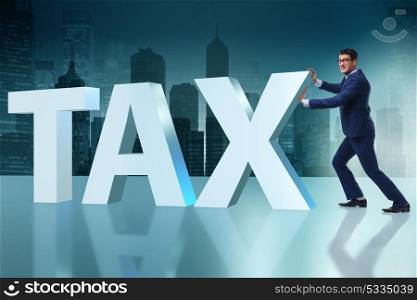 Businessman in high taxes concept