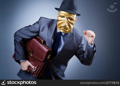 Businessman in industrial espionage concept