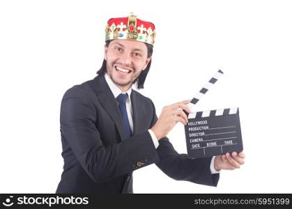 Businessman in king concept with movie board isolated on white