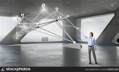 Businessman in modern interior. Businessman in modern interior drawing social connection lines