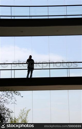 businessman in office building at the phone