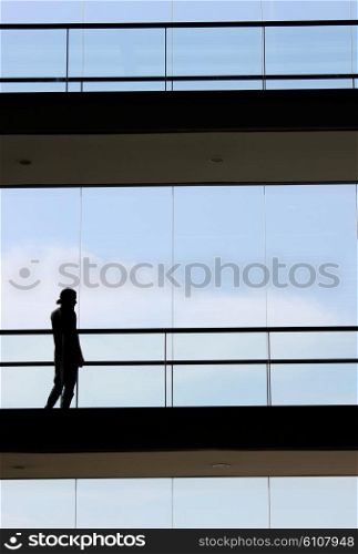 businessman in office building at the phone