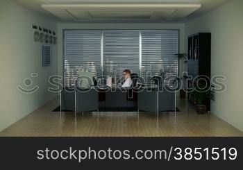 Businessman in Office with Skyline on the Background