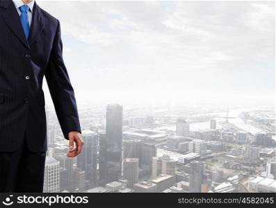 Businessman in office. Young successful businessman in white office interior close view