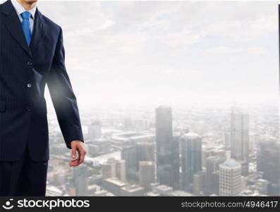 Businessman in office. Young successful businessman in white office interior close view