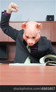 Businessman in pig mask reading
