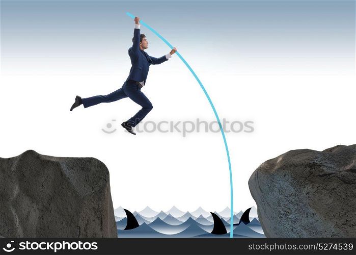 Businessman in pole vaulting concept