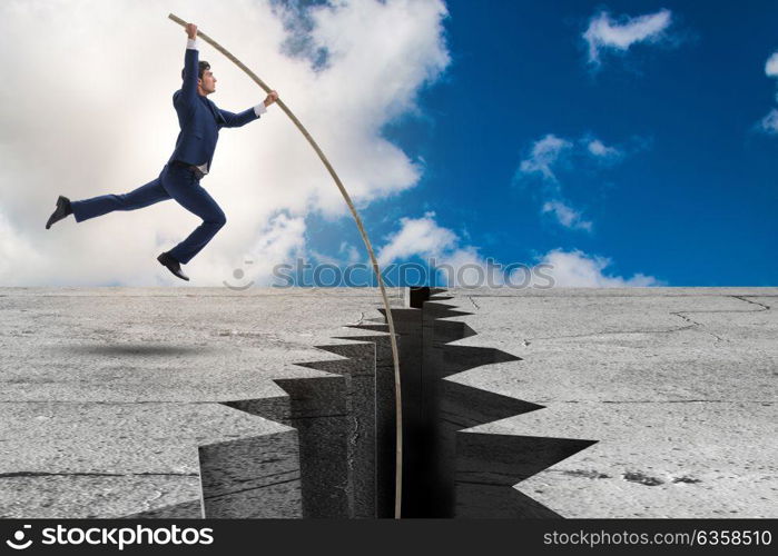 Businessman in pole vaulting concept. The businessman in pole vaulting concept