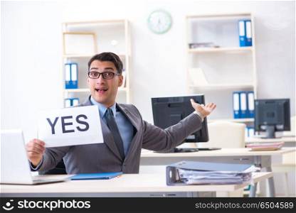 Businessman in positive yes answer in the office