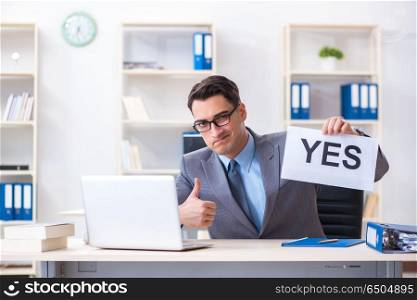 Businessman in positive yes answer in the office