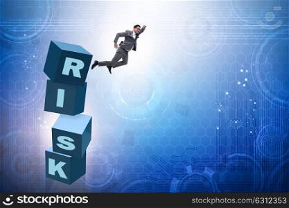 Businessman in risk and reward business concept. The businessman in risk and reward business concept