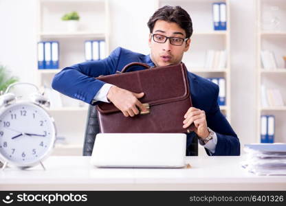 Businessman in rush trying to meet deadline