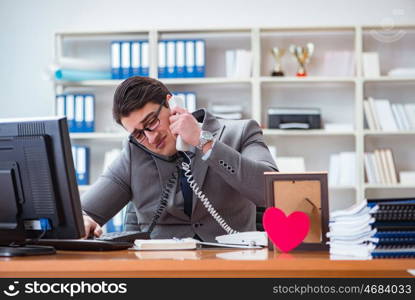 Businessman in saint valentine concept in office