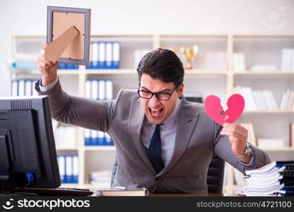 Businessman in saint valentine concept in office