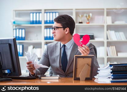 Businessman in saint valentine concept in office