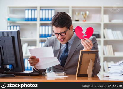 Businessman in saint valentine concept in office