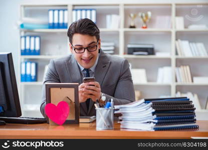 Businessman in saint valentine concept in office