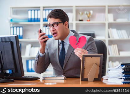 Businessman in saint valentine concept in office