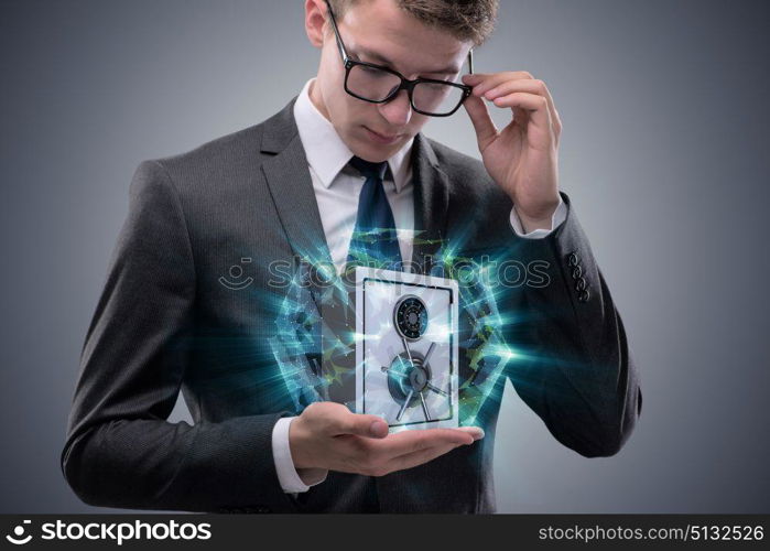 Businessman in security concept with safe