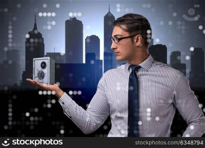 Businessman in security concept with safe