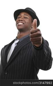 Businessman In Suit and Hat Giving the Thumbs Up.