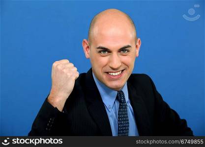businessman in suit tight-fisted