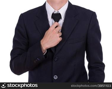 Businessman in suit tying the necktie isolated on white background