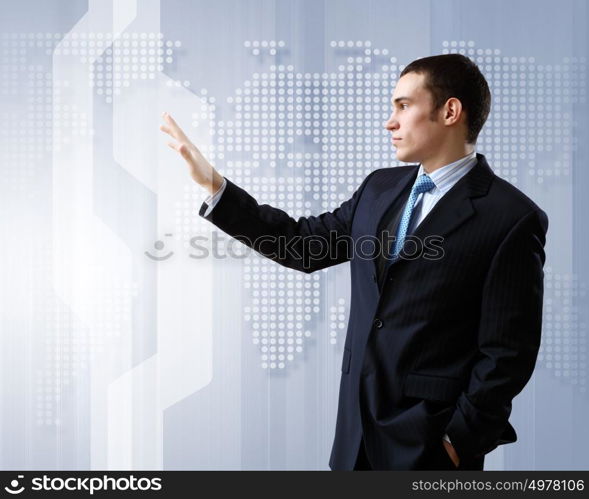 Businessman in suit working with touch screen technology