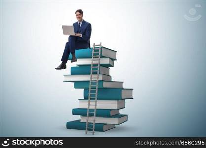 Businessman in telelearning concept with laptop