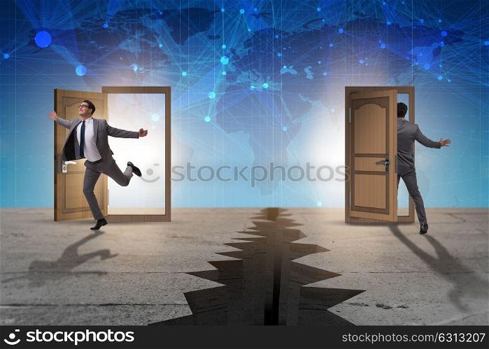 Businessman in teleportation concept with doors