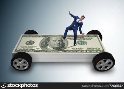 Businessman in the business concept with dollar car