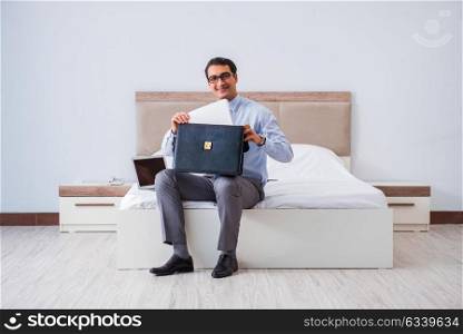Businessman in the hotel room during travel