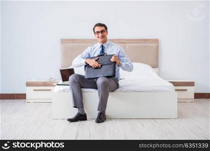 Businessman in the hotel room during travel