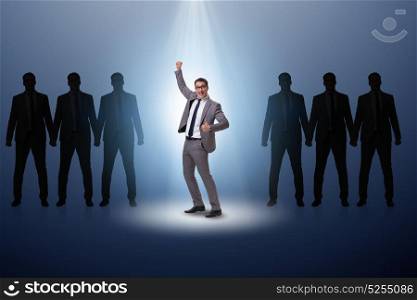 Businessman in the spotlight in business concept