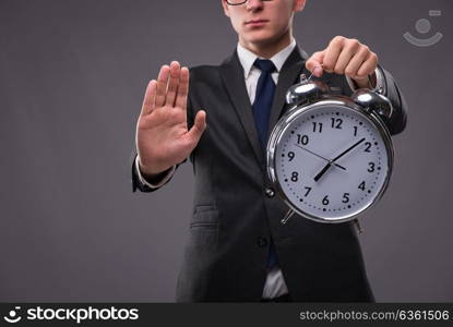 Businessman in time management concept