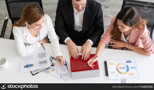 Businessman is in meeting discussion with colleague businesswomen in modern workplace office. People corporate business team concept.