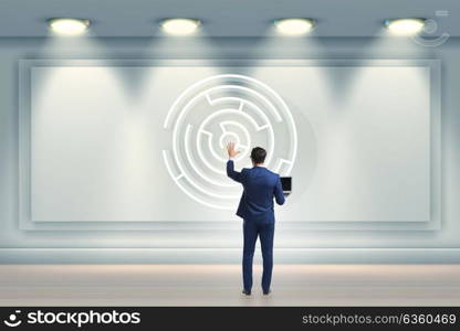 Businessman is looking for ways to escape from maze labyrinth. The businessman is looking for ways to escape from maze labyrinth