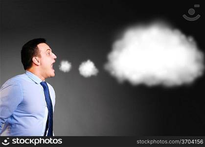 businessman is screaming a blank cloudy bubble