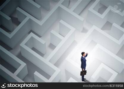 Businessman is trying to escape from maze labyrinth. The businessman is trying to escape from maze labyrinth