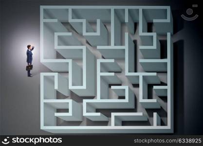 Businessman is trying to escape from maze labyrinth
