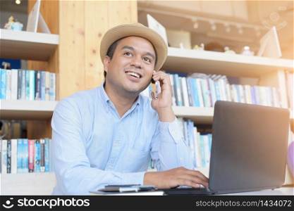 Businessman is working with notebook computers at home